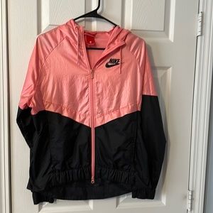 Women’s pink and black Nike windbreaker